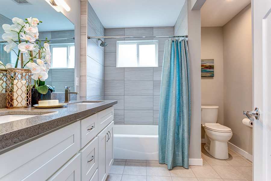 Elegant warm color bathroom design in a freshly remodeled house - Alton, IL